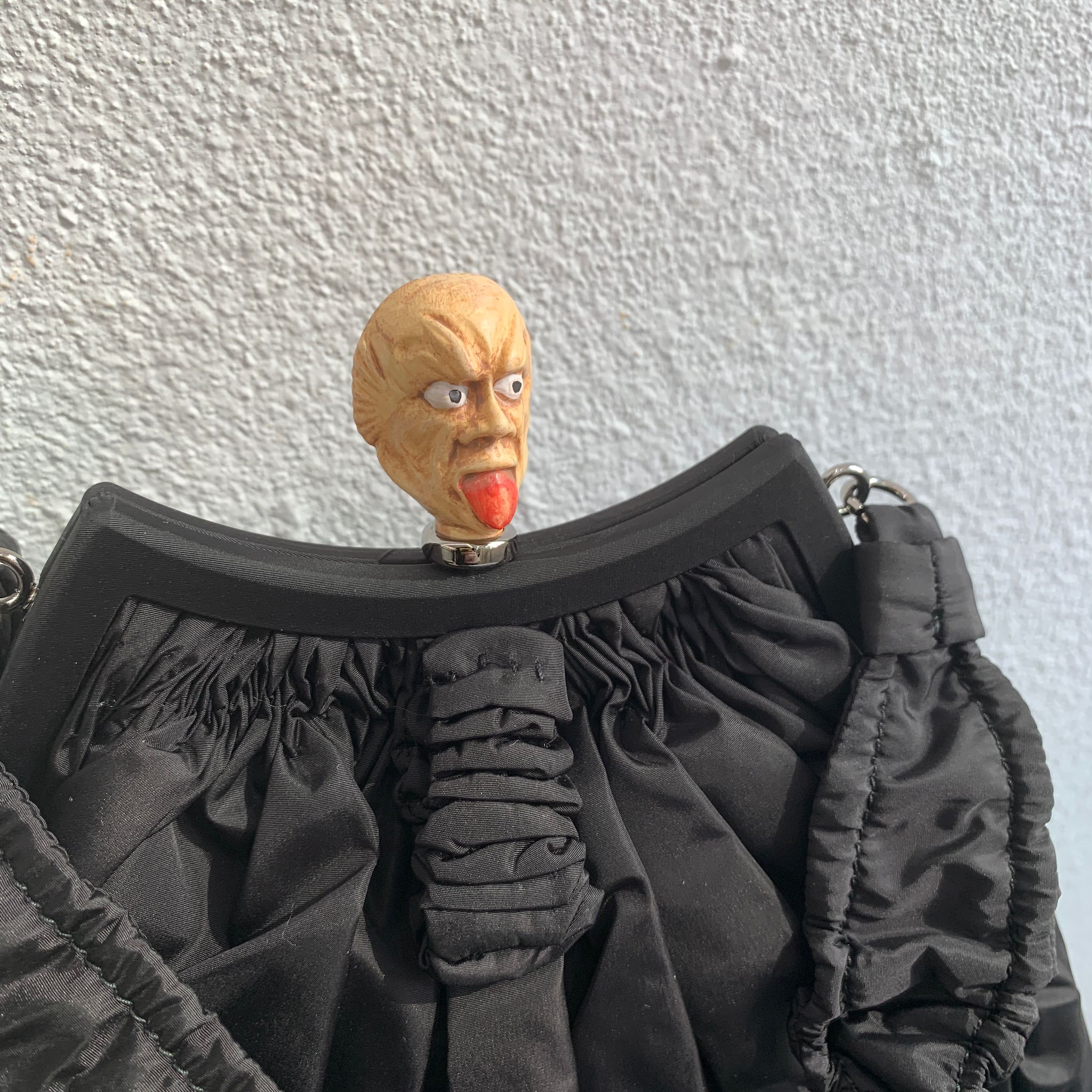 PRADA 秀款半獸人口袋包